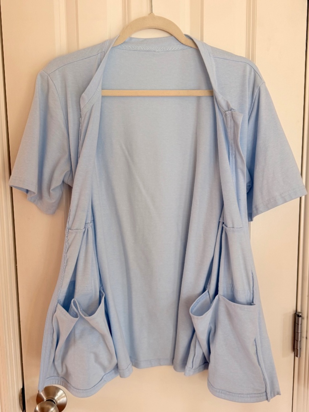 Post-mastectomy shirt with hidden pockets for drain bulbs